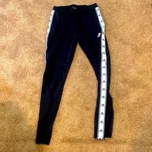 Adidas joggers size small with an adjustable zipper at the bottom of each leg